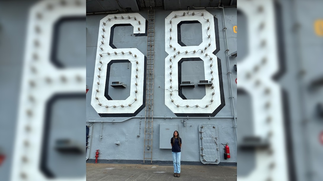 Riya Salian, an NSWC Crane intern, photographed onboard the USS Nimitz (CNV-68), a nuclear-powered aircraft carrier.