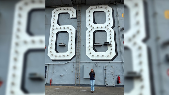 Riya Salian, an NSWC Crane intern, photographed onboard the USS Nimitz (CNV-68), a nuclear-powered aircraft carrier.