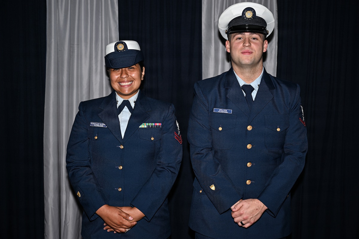 From left, U.S. Coast Guardsmen Yeoman Second Class Moisabley Gonzalez Guzman and Yeoman Third Class Maxwell Stillion, assigned to the Coast Guard Pay and Personnel Center in Topeka, Kansas, pose for a photo at McConnell Air Force Base, Kansas, July 6, 2026. For the first time in McConnell history, two Coast Guardsmen joined Airman Leadership School class 26-F. (U.S. Air Force photo by Senior Airman Amelio Brown)