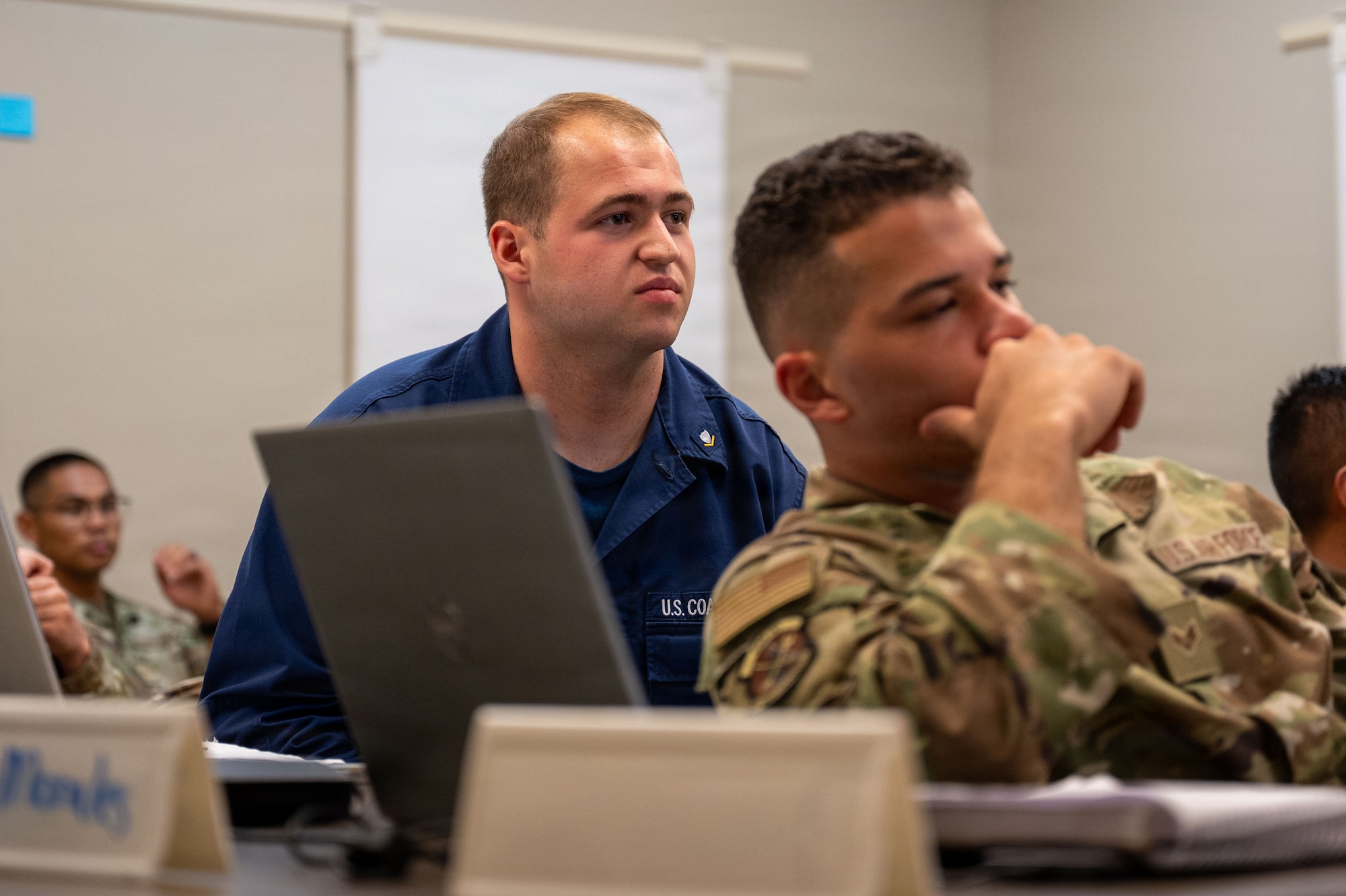 Yeoman Third Class Maxwell Stillion, assigned to Coast Guard Pay and Personnel Center in Topeka, Kansas, participates in Airman Leadership School at McConnell Air Force Base, Kansas, July 14, 2026. For the first time in McConnell history, two Coast Guardsmen joined ALS class 26-F. (U.S. Air Force photo by Staff Sgt. Felicia Przydzial)