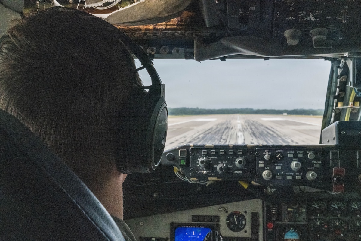 Maj. Duncan Richards, 350th Air Refueling Squadron pilot, reverse taxis a KC-135 Stratotanker down the runway at McConnell Air Force Base