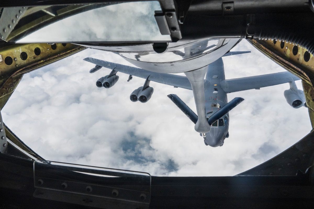 A B-52 Stratofortress assigned to the 5th Bomb Wing prepares to receive fuel from a KC-135 Stratotanker assigned to the 22nd Air Refueling Wing