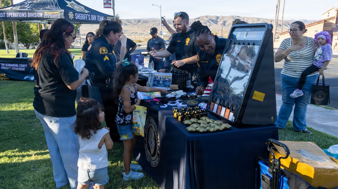 BARSTOW, Calif. — First responders with the Marine Corps Logistics Base Barstow Fire and Emergency Services engaged with local residents during National Night Out 2026 at Dana Park in Barstow, California, August 4. The annual nationwide community-policing event, hosted in partnership with the Barstow Police Department, the San Bernardino County Sheriff's Department, California Highway Patrol, and local public safety partners, featured interactive booths, emergency vehicle displays, and safety demonstrations to strengthen community partnerships and foster mutual trust. (U.S. Marine Corps photos by Katherine Cortez, COMMSTRAT)
