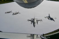 Two U.S. Air Force F-16 Fighting Falcons and F-35A Lightning II’s fly in formation in the North American Aerospace Defense Command Area of Responsibility, Aug 4, 2026. (U.S. Air Force photo by Senior Airman Spencer Hanson)