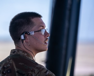 U.S. Air Force Airman 1st Class Luke Hodgen, 97th Operations Support Squadron air traffic control apprentice, clears an aircraft for takeoff at Altus Air Force Base, Oklahoma, Aug. 4, 2026. During a hands-on immersion tour, the 97th Air Mobility Wing command team had the opportunity to see air traffic controllers in action. (U.S. Air Force photo by Airman 1st Class Emma Wright)