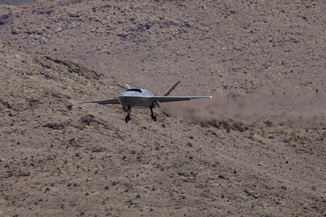 A YFQ-42A Dark Merlin Collaborative Combat Aircraft assigned to the Collaborative Combat Aircraft Experimental Operations Unit approaches Creech Air Force Base, Nev., July 22, 2026. The aircraft is designed to increase tactical flexibility by operating alongside crewed aircraft in contested, dynamic environments. (U.S. Air Force photo by Staff Sgt. Jake Jacobsen)