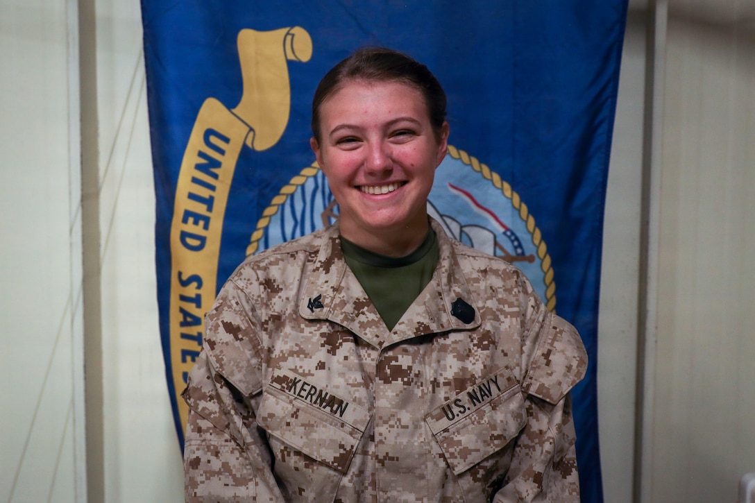U.S. Navy Hospitalman 3rd Class Johana Kernan, a corpsman with Combat Logistics Battalion 2, 2nd Regimental Combat Team, poses for a photo during Service Level Training Exercise 4-26 on Marine Corps Air Ground Combat Center, Twentynine Palms, California, August 4, 2026. Kernan was highlighted in a regimental shoutout for her recent performance. SLTE 4-26 is designed to be a challenging, realistic training environment that produces combat-ready forces capable of operating as an integrated Marine Air-Ground Task Force across all domains of military operations. (U.S. Marine Corps photo by Staff Sgt. Matthew Kirk)