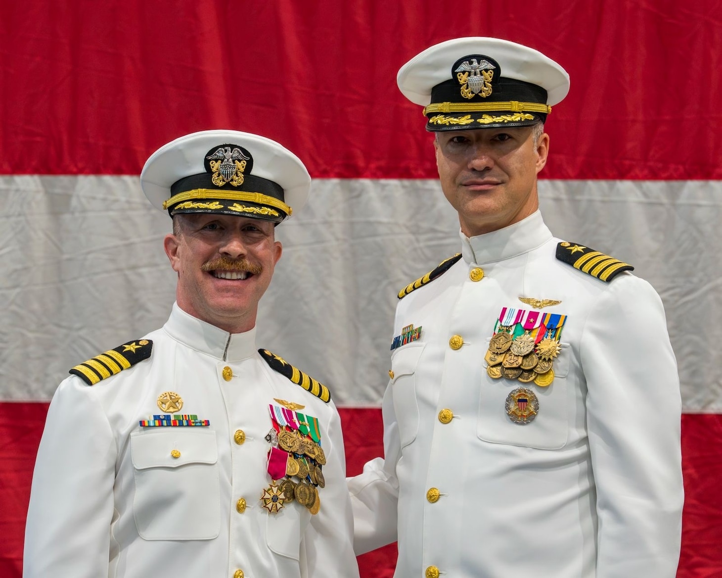 Capt. Frank C. Sanchez relieves Capt. Brian J. Schneider as commodore of Commander, Task Force 67 during a change of command ceremony at Naval Air Station Sigonella, Aug. 7, 2026. (Official U.S. Navy photo)