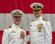 Capt. Frank C. Sanchez relieves Capt. Brian J. Schneider as commodore of Commander, Task Force 67 during a change of command ceremony at Naval Air Station Sigonella, Aug. 7, 2026. (Official U.S. Navy photo)
