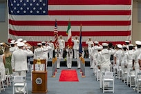Capt. Frank C. Sanchez relieves Capt. Brian J. Schneider as commodore of Commander, Task Force 67 during a change of command ceremony at Naval Air Station Sigonella, Aug. 7, 2026. (Official U.S. Navy photo)
