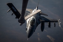 A U.S. Air Force F-16 Fighting Falcon approaches a KC-135 Stratotanker for aerial refueling in the U.S. Central Command area of responsibility, July 22, 2026. Aerial refueling extends the aircraft's range, endurance and operational flexibility, enabling fighter aircraft to project combat airpower and sustain operations across the region. (U.S. Air Force photo by Senior Airman Adriana Jordan-Alcaniz)