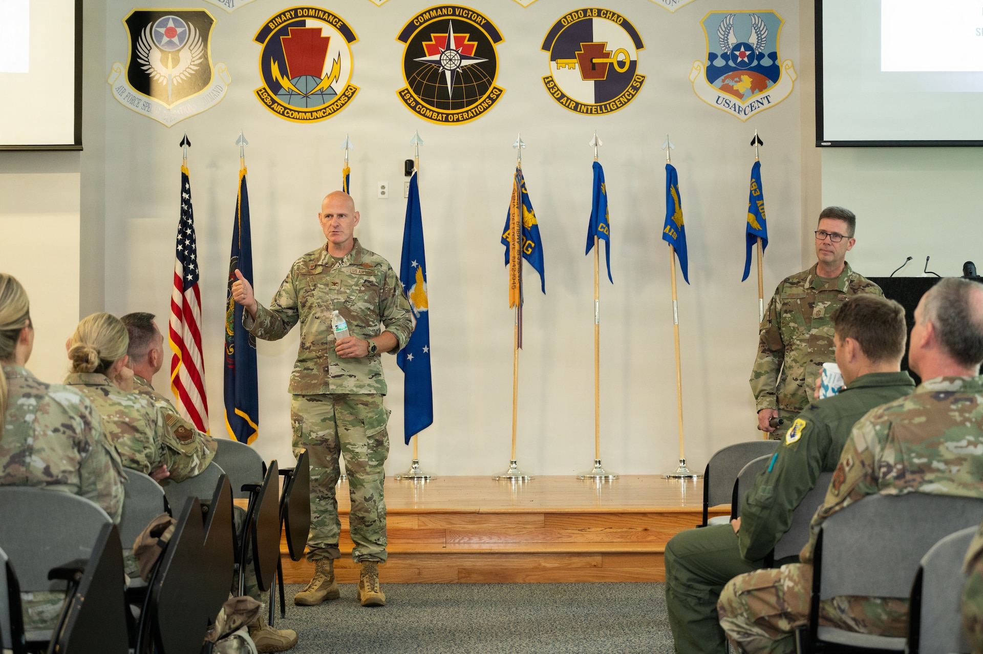 U.S. Air Force Col. Kristian Post, commander of the 111th Attack Wing, addresses commanders and senior enlisted leaders during the opening of the 111th Attack Wing Leadership Summit at the 193rd Air Operations Group in State College, Pennsylvania, July 21, 2026. The summit brought together wing leadership to discuss strategic priorities, strengthen collaboration, and align efforts to enhance mission readiness across the wing. (U.S. Air National Guard photo by Senior Airman Matthew Bergh)