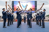 U.S. Air Force Honor Guard Drill Team performs in front of a crowd