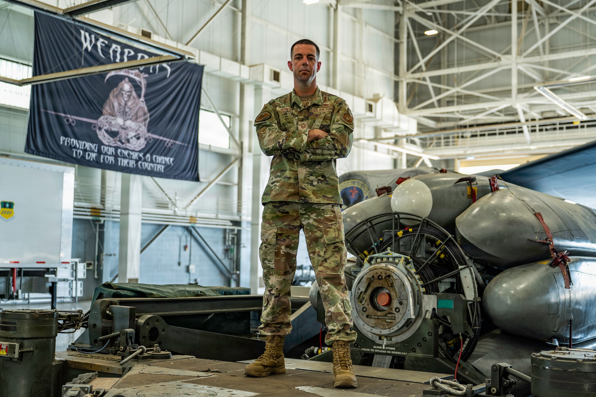 U.S. Air Force Master Sgt. Pete Nunes, Air Force Global Strike Command B-2 armament inspector, poses in a B-52H Stratofortress hangar at Barksdale Air Force Base, Louisiana, Aug. 4, 2026. Nunes and five other AFGSC Airmen were selected for this prestigious award on the basis of merit, job performance, superior leadership and personal achievements. (U.S. Air Force photo by Senior Airman Rhea Beil)