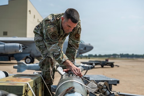 U.S. Air Force Master Sgt. Pete Nunes, Air Force Global Strike Command B-2 armament inspector, inspects munitions at Barksdale Air Force Base, Louisiana, Aug. 4, 2026. Nunes' passion for developing others has given him opportunities to work alongside Airmen, senior noncommissioned officers and civilians across the installation, broadening his perspective as a leader. (U.S. Air Force photo by Senior Airman Rhea Beil)