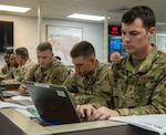 Students of the Arkansas National Guard’s Guardian Response Training Academy participate in a winter storm response exercise on Aug. 4, 2026, at Camp Joseph T. Robinson, Arkansas. The exercise tested the students' ability to coordinate a multi-agency response in emergency conditions. The Guardian Response Training Academy, hosted annually by the Arkansas National Guard, develops mission-ready Soldiers and Airmen capable of supporting their communities through safe, disciplined and professional response during emergency operations. Photo by Lt. Col. William Howard.