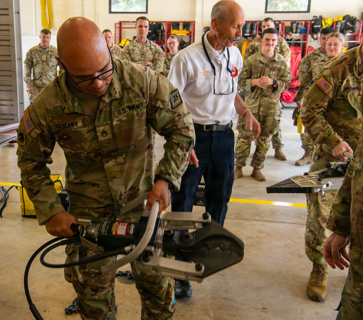 Students of the Arkansas National Guard’s Guardian Response Training Academy receive hands-on training with vehicle extrication equipment Aug. 5, 2026, at Camp Joseph T. Robinson, Ark.
