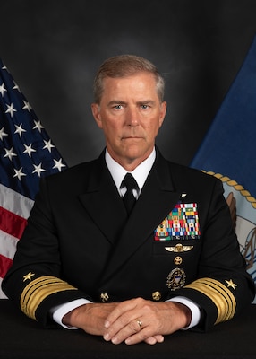 RADM Miguez, bio photo