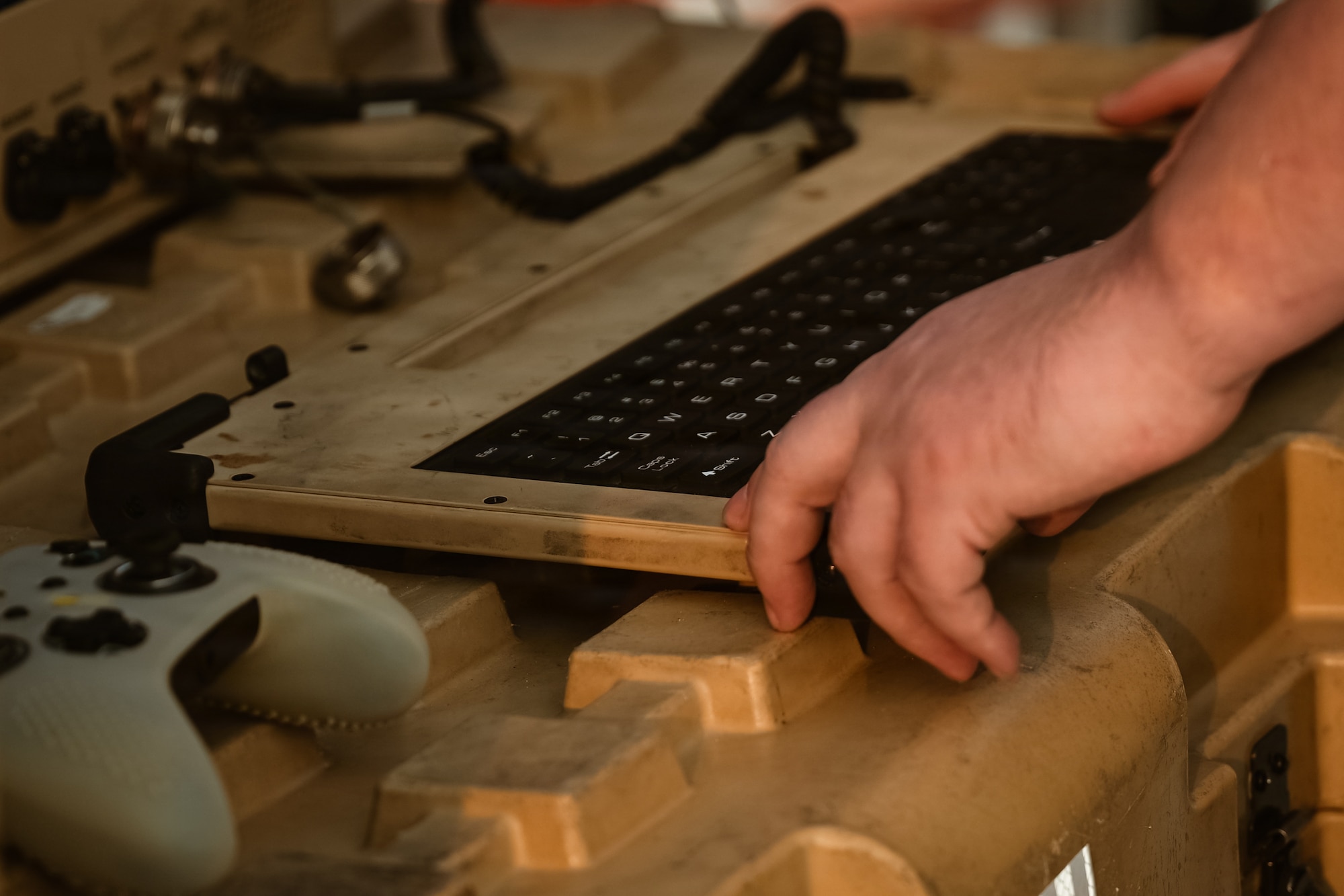 An Airman operates an MQ-9 Reaper portable aircraft control station at Alpena Combat Readiness Training Center, Michigan, July 20, 2026.