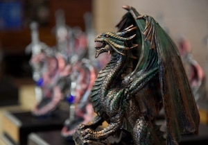 A dragon trophy is on display.
