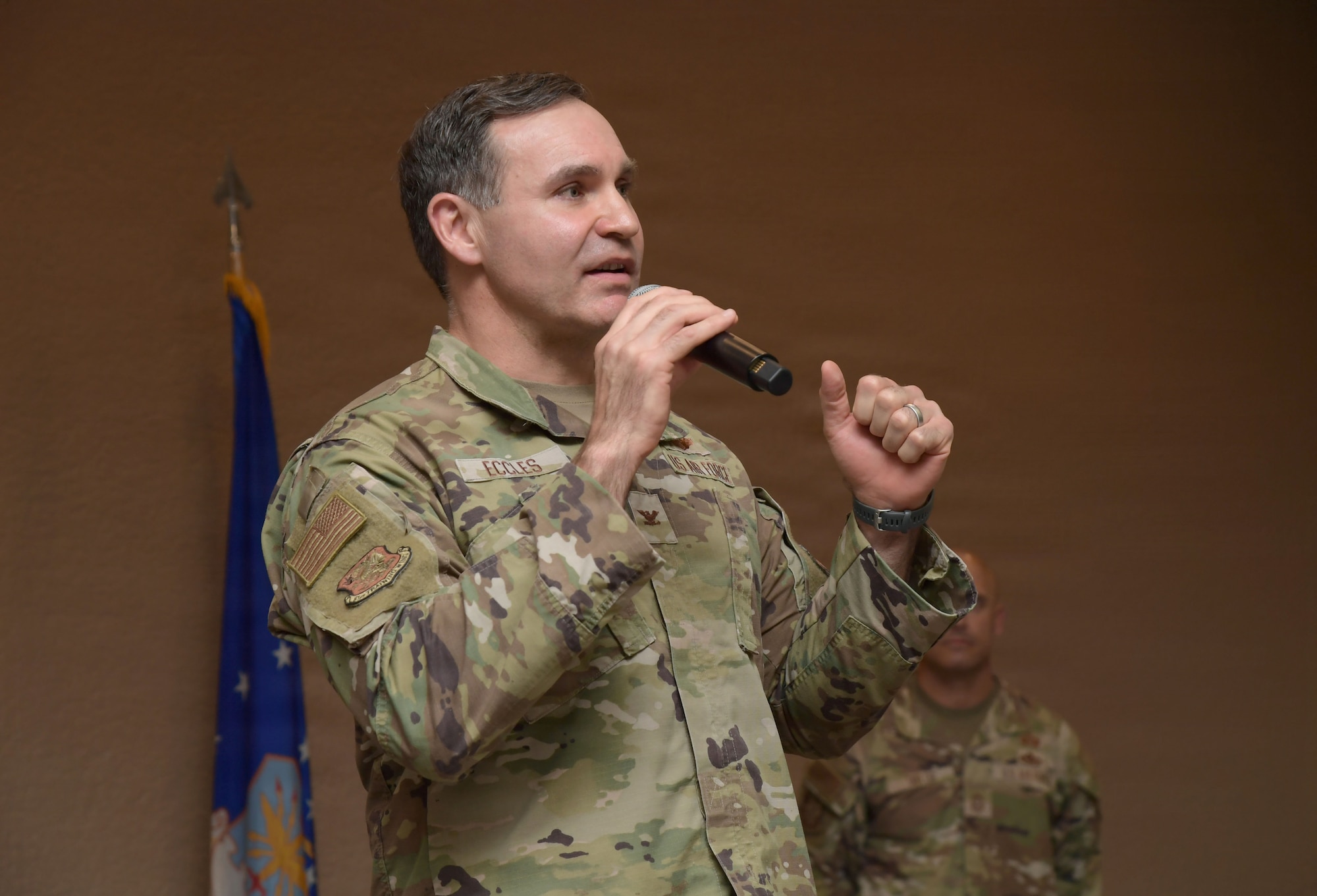 A man wearing a U.S. Air Force uniform speaks.