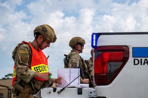 Airman looking at papers.