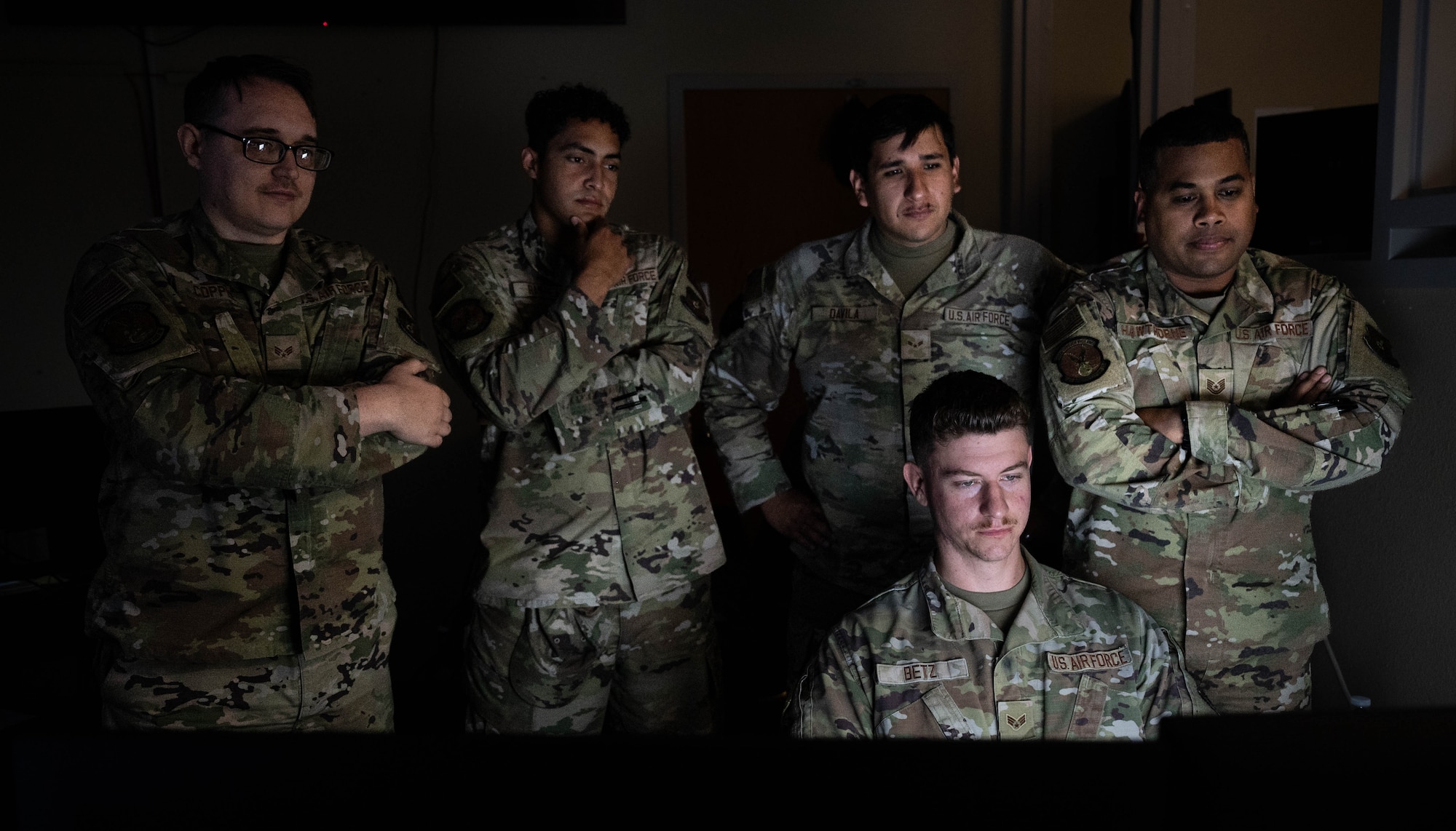 U.S. Airmen with the 5th Communications Squadron (5th CS) Communications Focal Point (CFP) work center conduct training at Minot Air Force Base, North Dakota, Aug. 5, 2026.