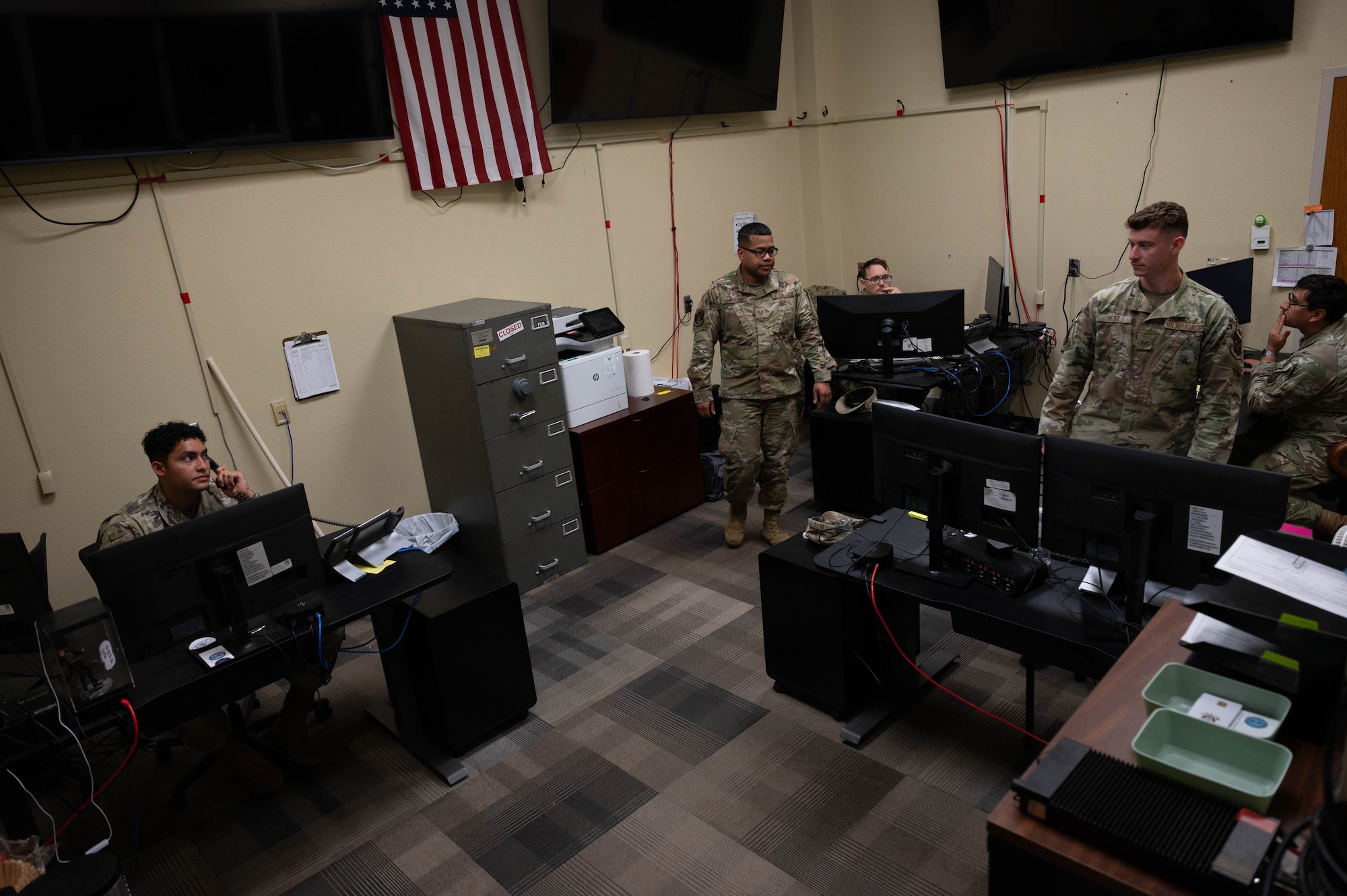 U.S. Airmen with the 5th Communications Squadron (5th CS) Communications Focal Point (CFP) work center conduct routine tasks at Minot Air Force Base, North Dakota, Aug. 5, 2026.