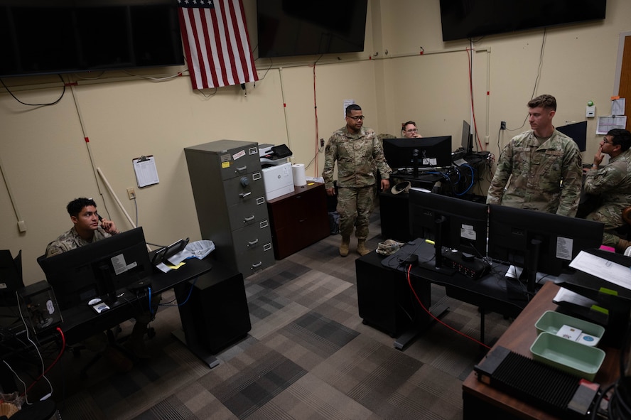 U.S. Airmen with the 5th Communications Squadron (5th CS) Communications Focal Point (CFP) work center conduct routine tasks at Minot Air Force Base, North Dakota, Aug. 5, 2026.