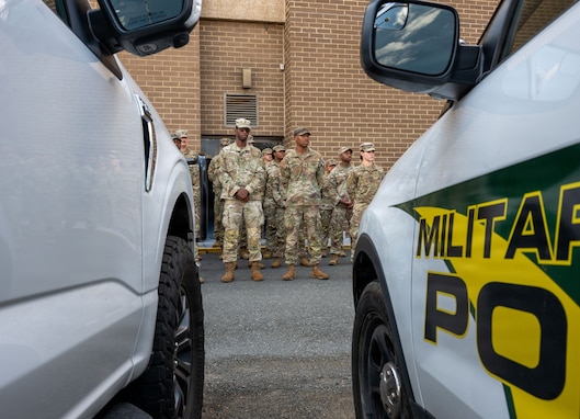 Georgia National Guardsmen assigned to Joint Task Force-District of Columbia (JTF-DC) in support of the DC Safe and Beautiful mission, stand in formation during a recognition ceremony in Crystal City, Va., July 31, 2026. About 5000 National Guard members are supporting the mission, providing critical assistance to the Metropolitan Police Department to help ensure the safety of residents, commuters, and visitors throughout the District.