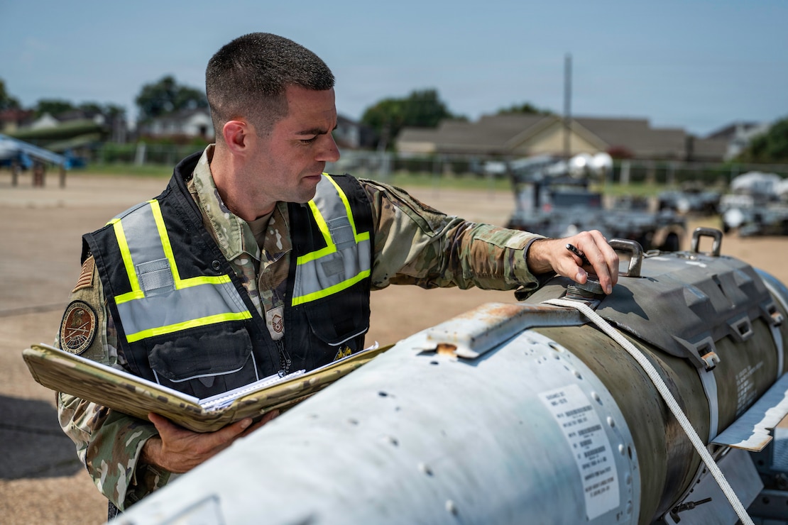 U.S. Air Force Master Sgt. Pete Nunes, Air Force Global Strike Command B-2 armament inspector, inspects munitions at Barksdale Air Force Base, Louisiana, Aug. 4, 2026. Nunes’ work helps provide senior leaders confidence that one of the nation's most critical missions remains ready whenever called upon. (U.S. Air Force photo by Senior Airman Rhea Beil)