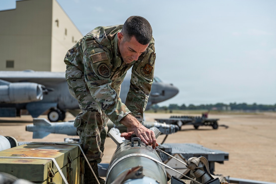 U.S. Air Force Master Sgt. Pete Nunes, Air Force Global Strike Command B-2 armament inspector, inspects munitions at Barksdale Air Force Base, Louisiana, Aug. 4, 2026. Nunes' passion for developing others has given him opportunities to work alongside Airmen, senior noncommissioned officers and civilians across the installation, broadening his perspective as a leader. (U.S. Air Force photo by Senior Airman Rhea Beil)