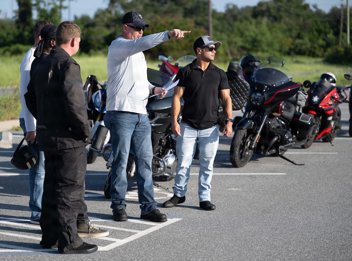 Man points during motorcycle training