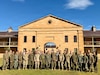 Representatives from the Australian Army, U.S. Army, U.S. Marine Corps, Japan Ground Self-Defense Force, Philippine Army and Philippine Marine Corps pose for a group photo during a Land Forces Dialogue Staff Working Group in Sydney, Australia, Aug. 6, 2026.