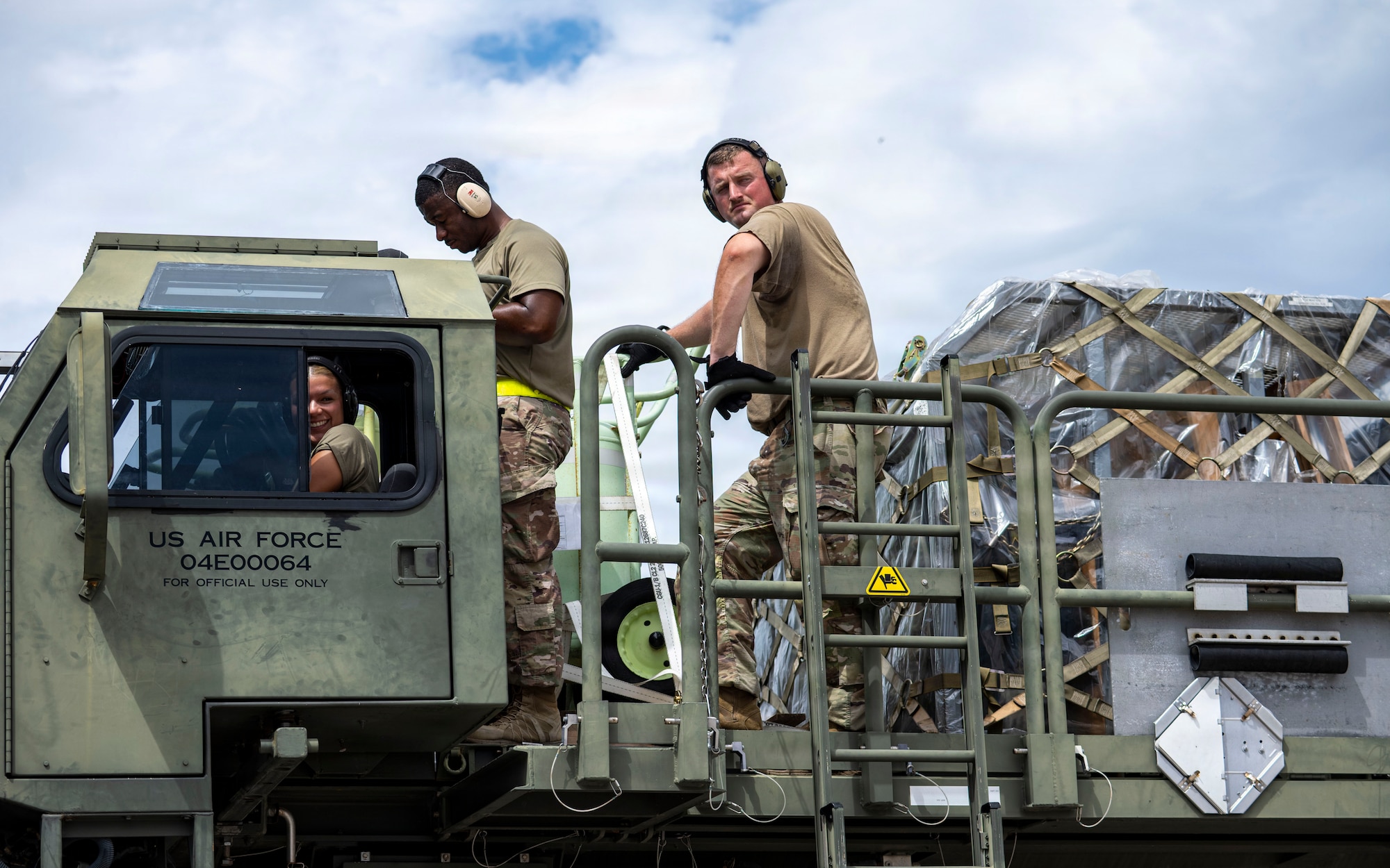 Airmen assigned to the 6th Logistics Readiness Squadron, prepare to offload cargo following a redeployment at MacDill Air Force Base Florida, July 3, 2026. The aircraft carried Airmen assigned to the 50th and 91st Air Refueling Squadrons, returning from a scheduled deployment providing critical aerial refueling capabilities to joint and coalition forces. (U.S. Air Force photo by Senior Airman Monique Stober)