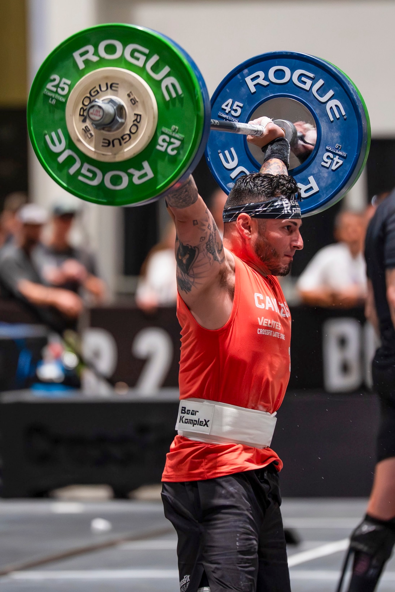 U.S. Air Force Tech. Sgt. Vincent Cavazos, Force Protection Flight noncommissioned officer in charge with the 36th Security Forces Squadron, raises a weighted barbell during the 2026 Adaptive CrossFit Games in San Jose, California, July 25, 2026.
