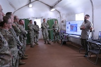 PELE STRIKE reinforced readiness through technology integration, serving as a testing site for Headquarters, Department of the Army G-2 emerging capabilities, including the Digital Interrogation Video Archiving System. A representative from HQDA G-2X provided overviews on DIVAS, CHS, TactiLink, and other emerging artificial intelligence-enabled solutions designed to improve transcription and translation support across the force.