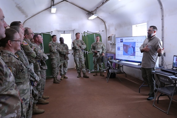 PELE STRIKE reinforced readiness through technology integration, serving as a testing site for Headquarters, Department of the Army G-2 emerging capabilities, including the Digital Interrogation Video Archiving System. A representative from HQDA G-2X provided overviews on DIVAS, CHS, TactiLink, and other emerging artificial intelligence-enabled solutions designed to improve transcription and translation support across the force.