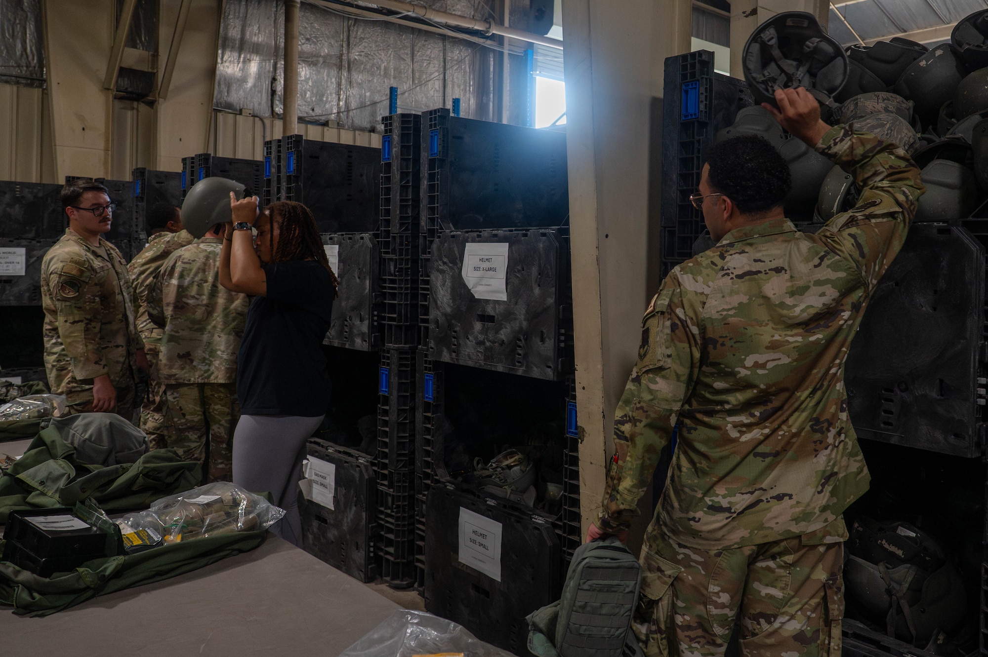 U.S. Air Force Airmen recently assigned to the 8th Fighter Wing try on training gear at Kunsan Air Base, Republic of Korea, Aug. 3, 2026. The 8th LRS’ daily efforts are vital in providing ready, reliable logistics to enable combat power and ensure Kunsan AB is outfitted to perform its mission and remain ready to “Fight Tonight.” (U.S. Air Force photo by Staff Sgt. Cedrique Oldaker)