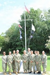 Rear Adm. Robert Hawkins, commander, Naval Medical Forces Atlantic (NMFL), director, Defense Health Network (DHN) Atlantic, and director of the Navy Nurse Corps, stands for a group photo with members of the Navy Nurse Corps during a visit to Navy Medicine Readiness and Training Command (NMRTC) Patuxent River, Aug. 4. Hawkins hosted an open-dialogue session with the command's Nurse Corps officers, fielding direct questions regarding the future of Nurse Corps alignment and structural changes within Navy Medicine. As director of the Navy Nurse Corps, Hawkins emphasized the distinct professional development, educational benefits, and clinical leadership opportunities that make remaining in active service highly rewarding for junior officers.

Pictured from left to right are: Cmdr. Jennifer Williams, officer in charge, Navy Medicine Readiness and Training Unit (NMRTU) Dahlgren and director of branch clinics; Cmdr. Shadaq Torres, director of clinical support services and chief nursing officer; Cmdr. Nichole Benson; Capt. Ken Radford, commanding officer, NMRTC Patuxent River; Rear Adm. Robert Hawkins; Capt. Ron Dewees, executive officer, NMRTC Patuxent River; Lt. Timothy Mohammad; Cmdr. MaryPat Tobola, director of health services; Lt. Catherine Gonzalez; and Lt. Patricia Baker.