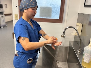 Hospital Corpsman 2nd Class Pongmon Tunbuth, assigned to Navy Medicine Readiness and Training Command Rota, serves as a certified surgical technologist at Naval Station Rota, Spain, July 31, 2026. By supporting surgeons during a variety of medical procedures, Tunbuth helps ensure service members receive the care needed to remain medically ready and support operational missions worldwide. (U.S. Navy photo by Lt. Cmdr. Alicia Sacks)