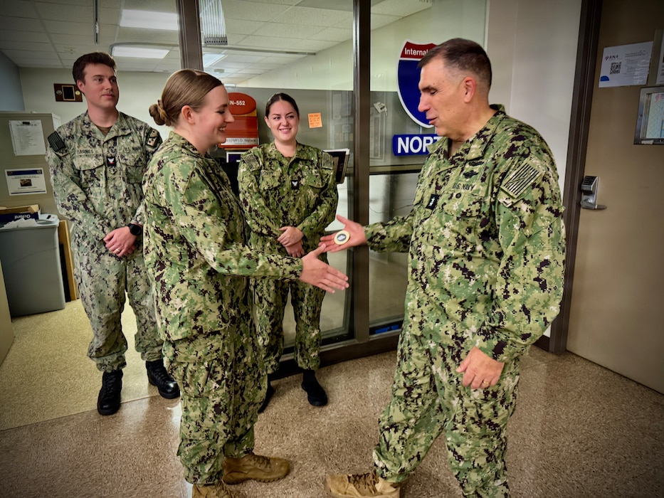 SAN DIEGO (Aug. 6, 2026) – Acting Surgeon General and Chief, U.S. Navy Bureau of Medicine and Surgery, Rear Adm. Matthew Case (right) presents a command coin to Hospital Corpsman 3rd Class Zoe Miner in the 5 North medical ward at Naval Medical Center San Diego (NMCSD). Case toured the ward to meet directly with staff and recognize outstanding Sailors for their immeasurable dedication to patient care and Navy Medicine's mission. (U.S. Navy photo by Contributed)