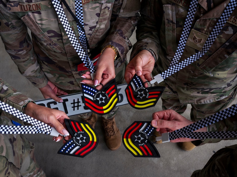 U.S. Air Force technical sergeant selects assigned to Ramstein Air Base pass through the finish line during the Technical Sergeant promotion release ceremony at Ramstein Air Base, Germany, Aug 7, 2026.