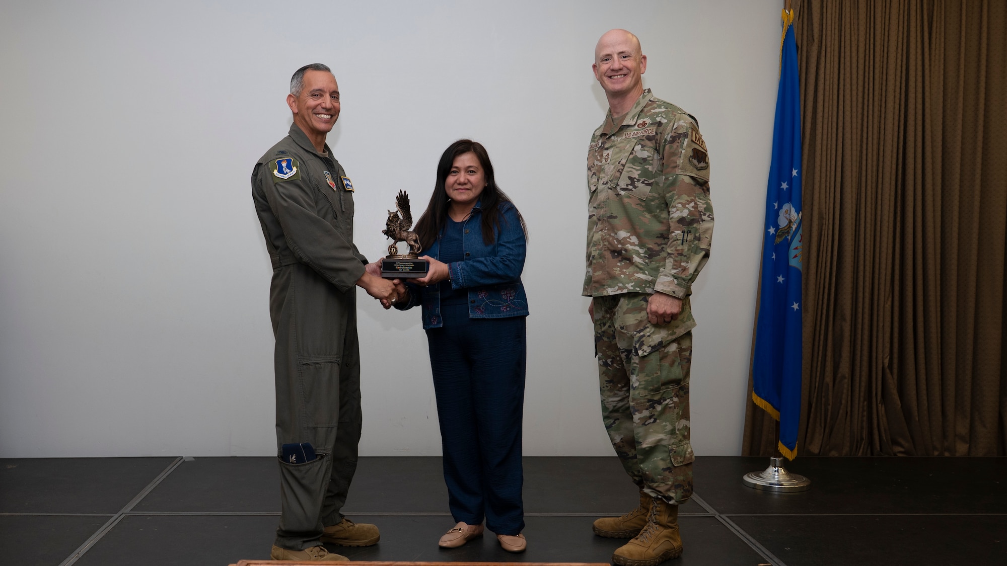 Airmen pose for a photo