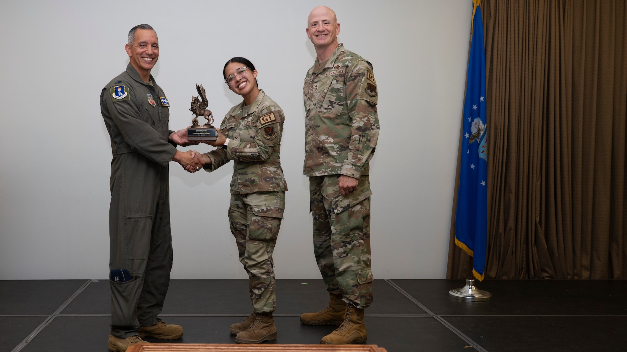 Airmen pose for a photo