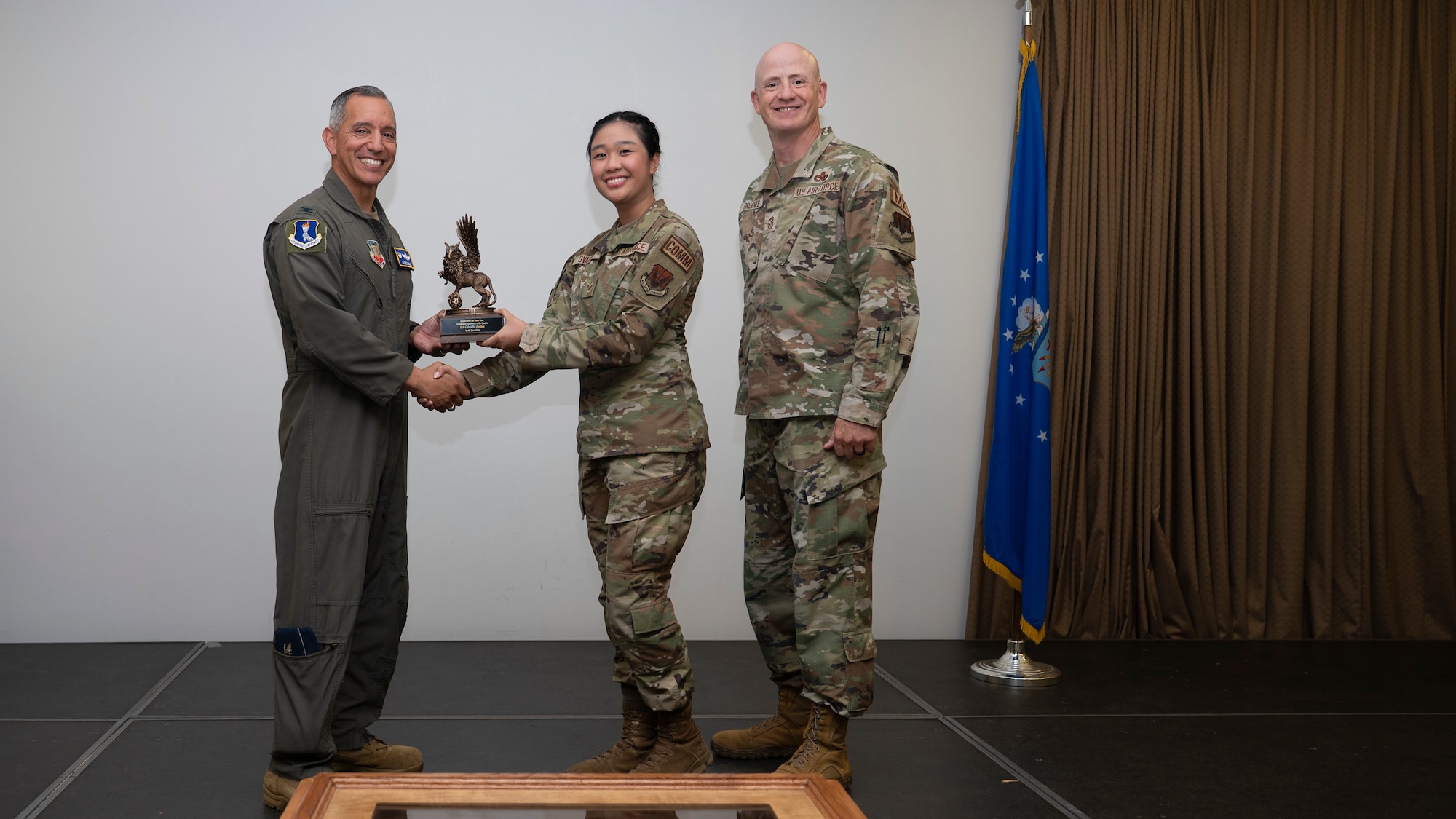 Airmen pose for a photo