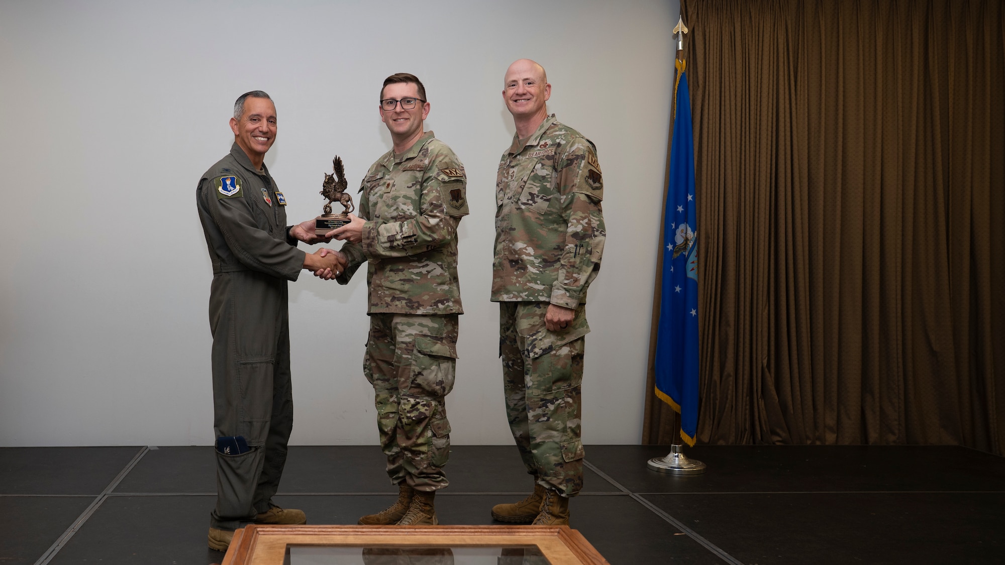 Airmen pose for a photo