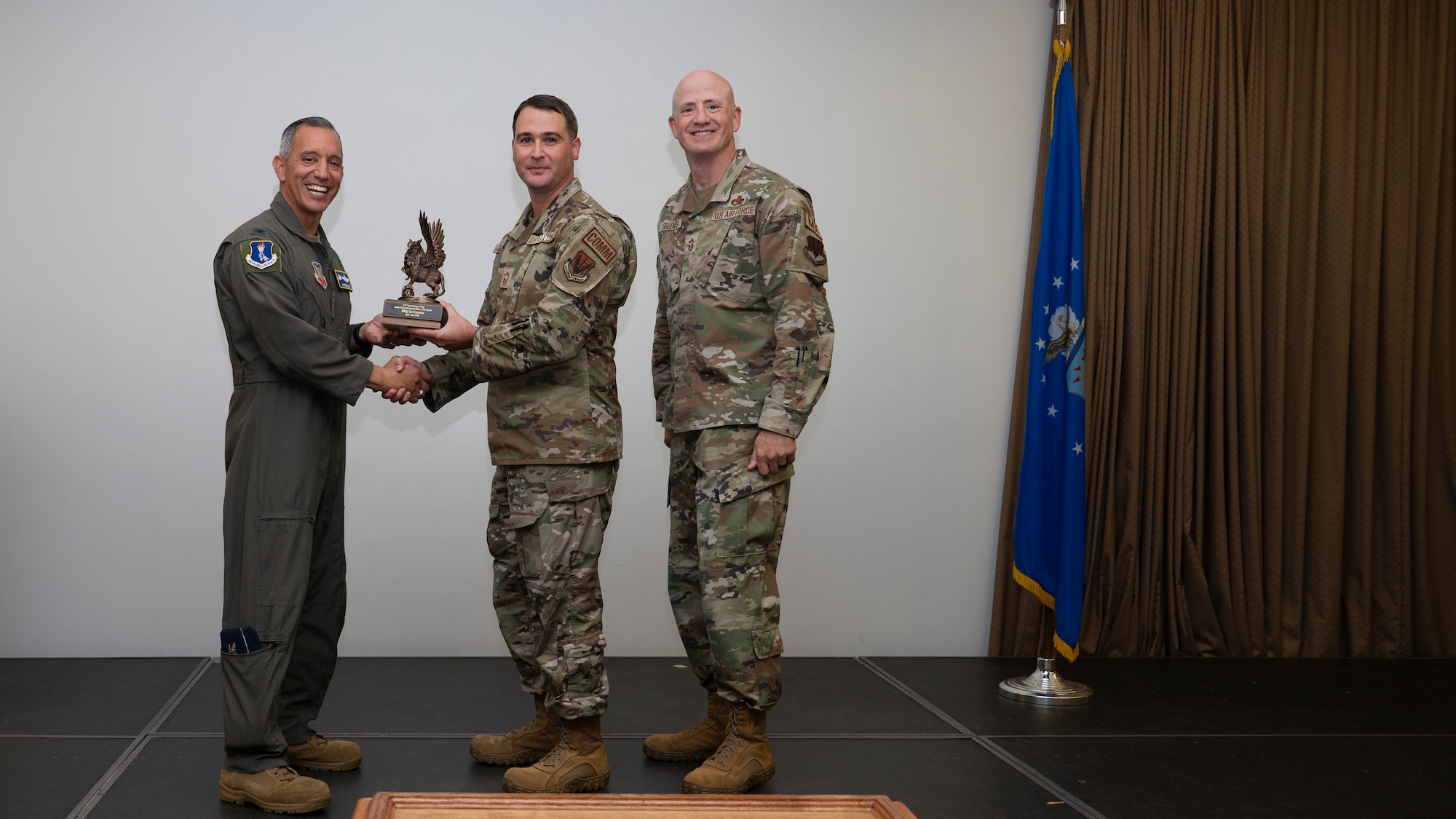 Airmen pose for a photo