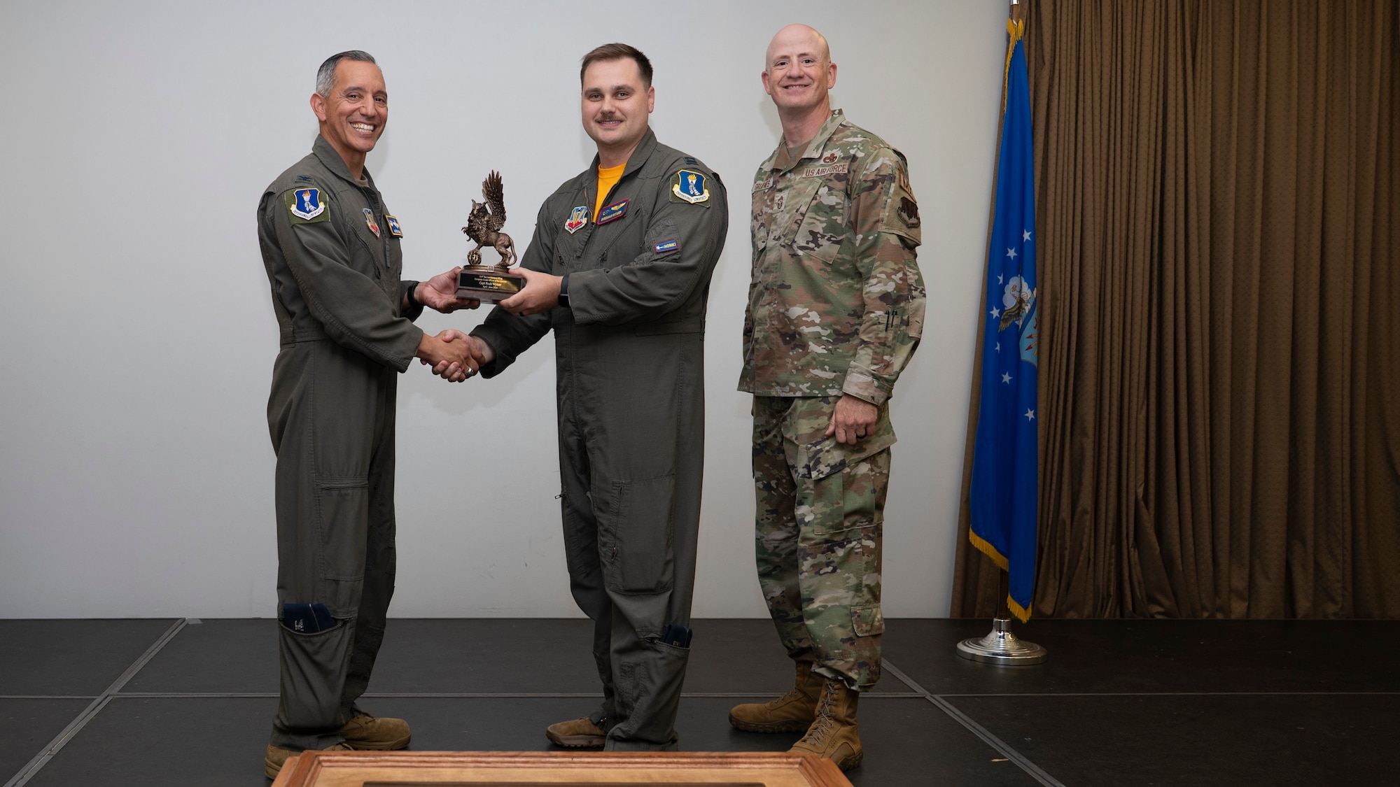 Airmen pose for a photo