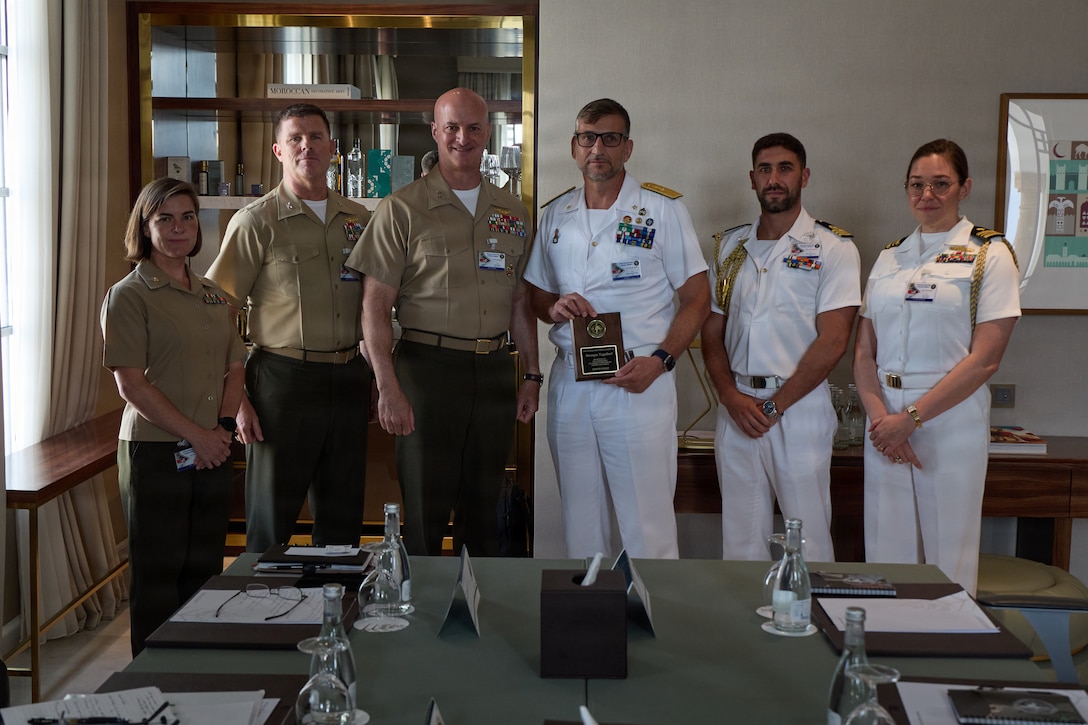 U.S. Marines with U.S. Marine Corps Forces, Europe and Africa, left, and Italian Navy key leaders of the San Marco Brigade, right, participate in a key leader engagement in Rabat, Morocco, July 21, 2026. They met during the African Maritime Forces Summit 2026 to build their relationship and discuss the complexities of maritime security. Co-hosted by the Royal Moroccan Armed Forces, U.S. Naval Forces Africa, and U.S. Marine Corps Forces, Europe and Africa, AMFS 2026 brings together international partners to address shared security challenges under the theme "Innovation and Partnership to Strengthen Maritime Security." (U.S. Marine Corps photo by Cpl. Garrett Gillespie)